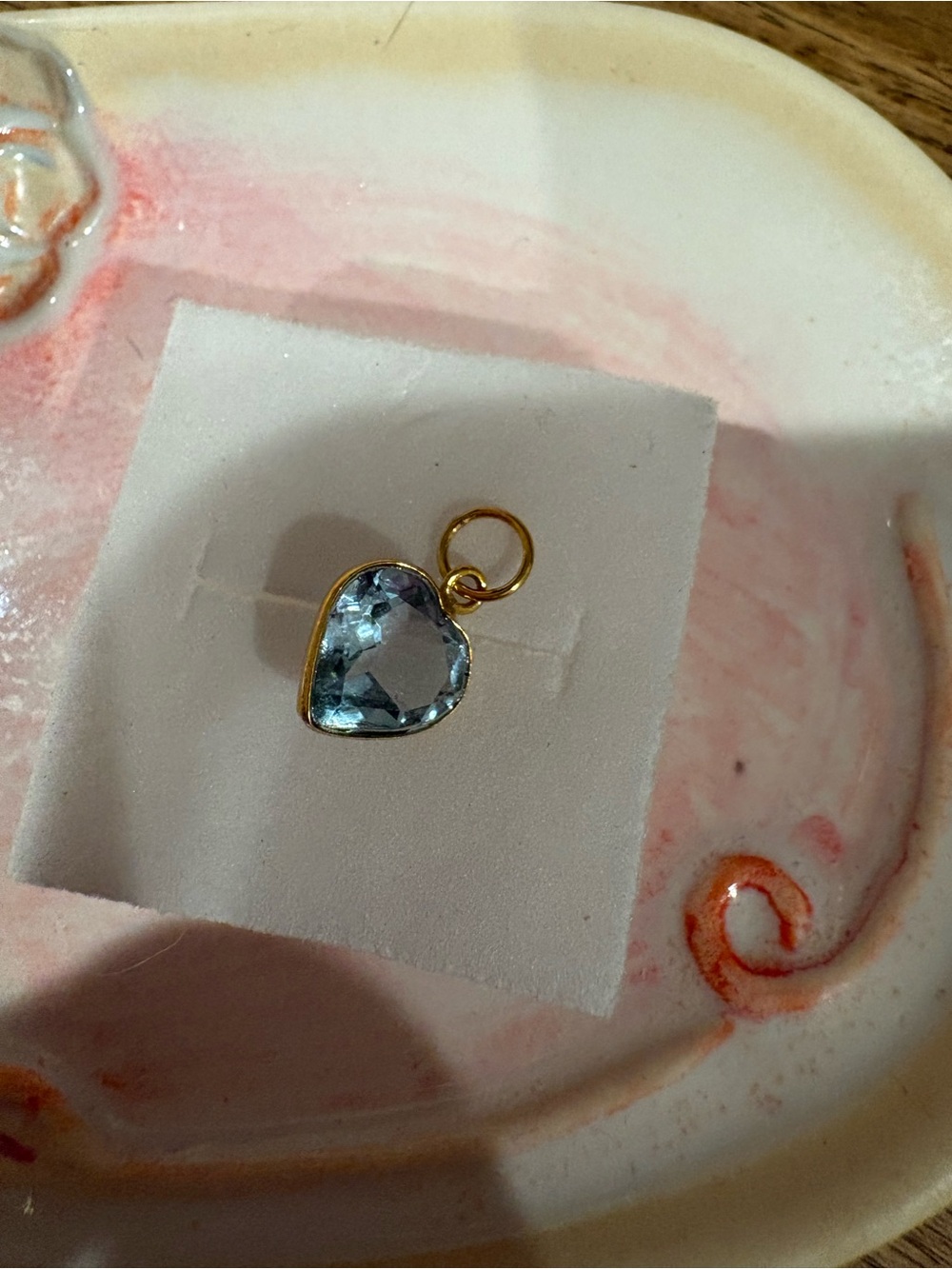 Blue tourmaline heart pendant set in 18k gold